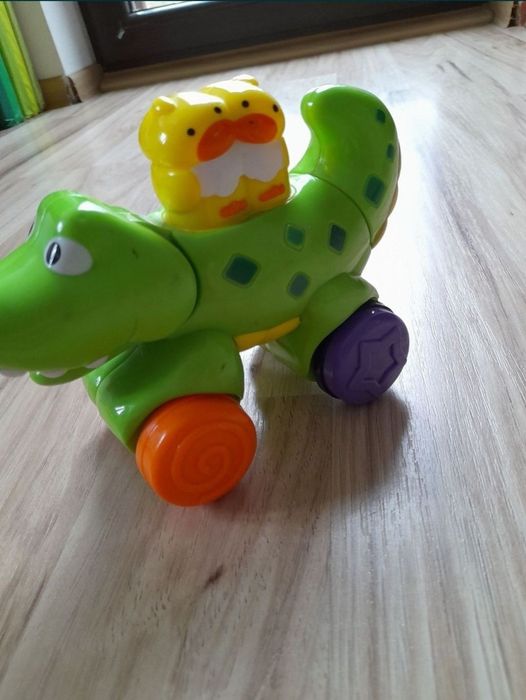 joc Jucarie bebelusi Fisher Price Crocodil apasa merge

crocodil cu ro
