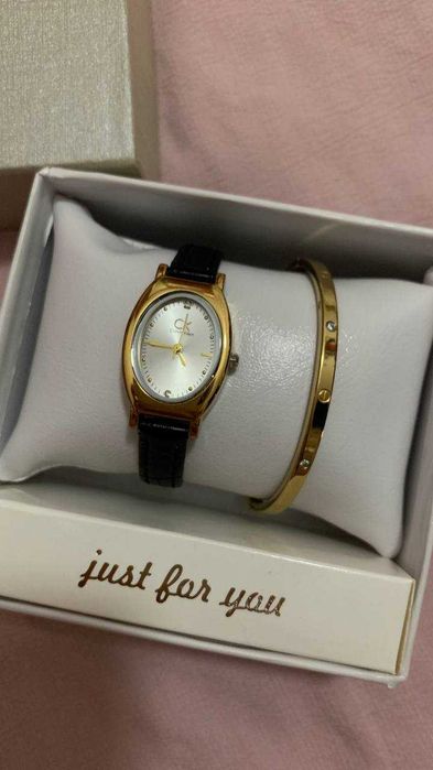 Часы и браслет в стиле cartier