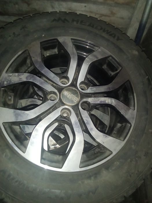 Продам Титановые диски с зимней резиной