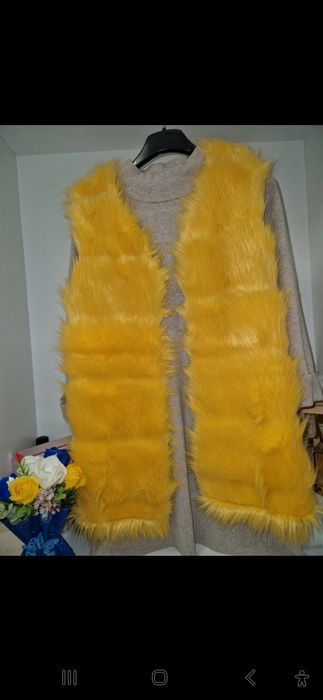 Vesta blana artificial