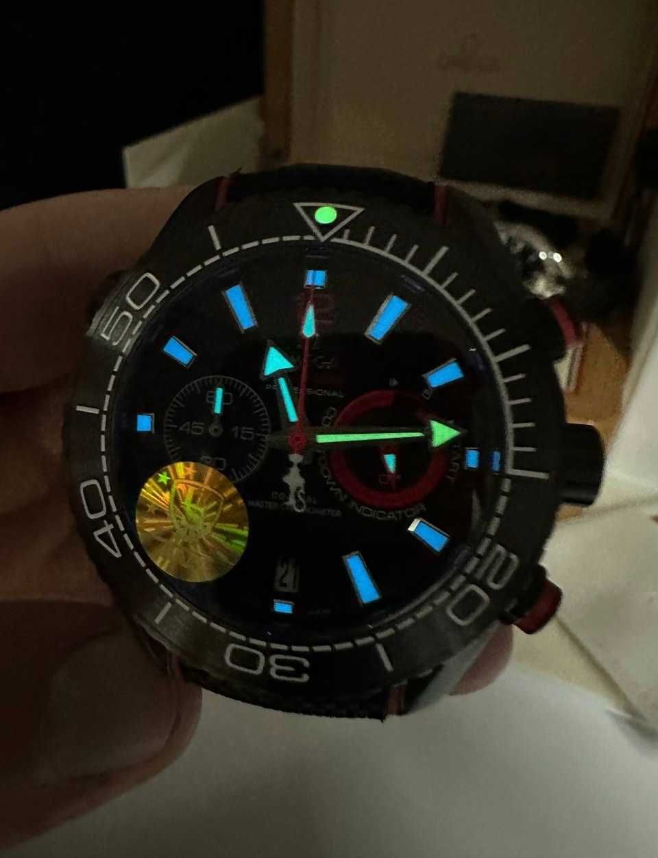 omega seamaster planetocean deep black / red