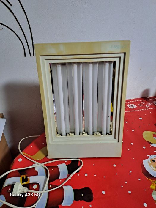 Aparat de bronzat facial