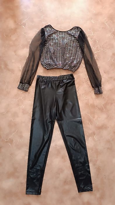 Продам нарядный костюм (штаны и кофта)для девочки 9-11 лет