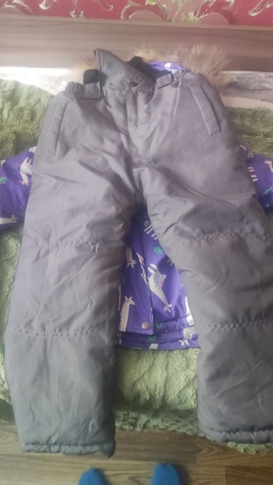 Продам зимний комбинезон на девочку !