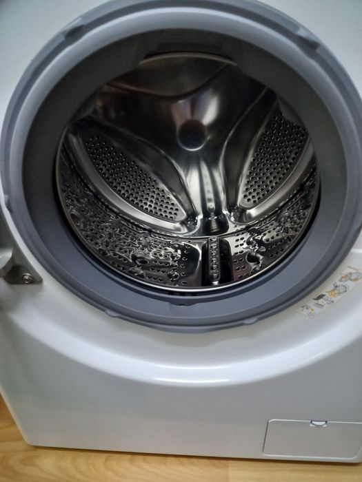 Mașină de spălat rufe LG 6,5 kg și bicicletă pliabilă