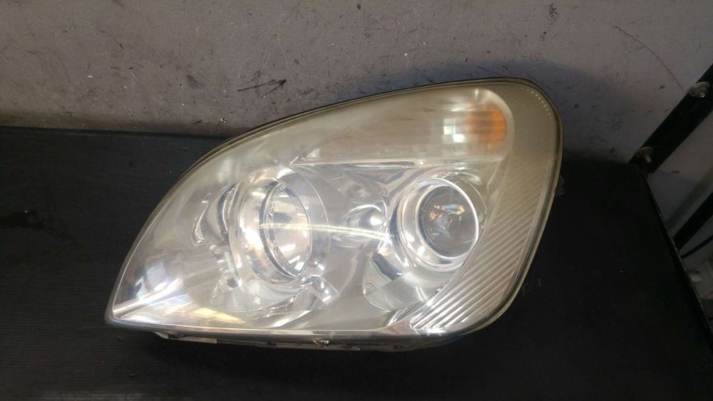 Far stanga kia carens 3 un 921011d0l