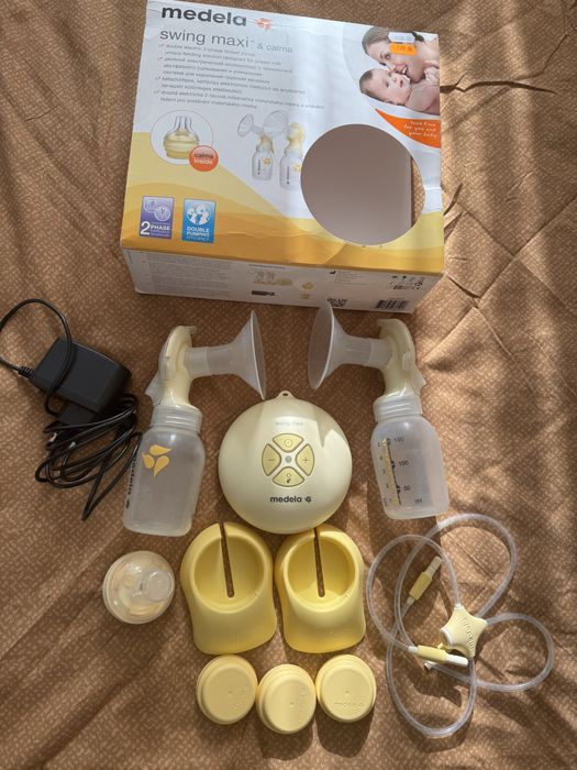 Помпа за кърма Medela swing maxi