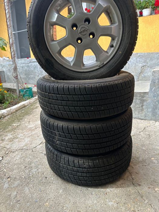 Vând set jante aliaj + cauciucuri iarnă Opel Astra 195/65/R15 DOT 2624