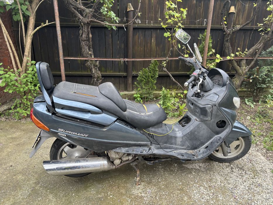 Vand sau schimb  suzuki burgman 400cc