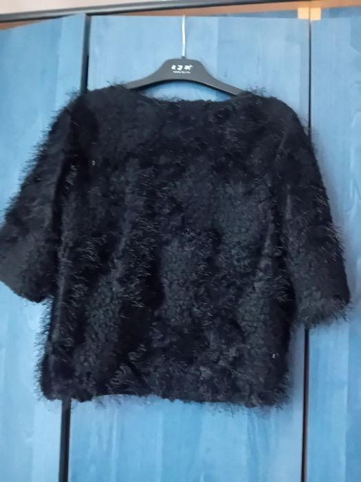 Scurtă elegantă de damă