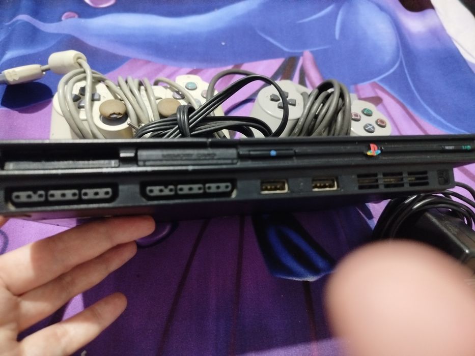 PS 2 Slim consola.