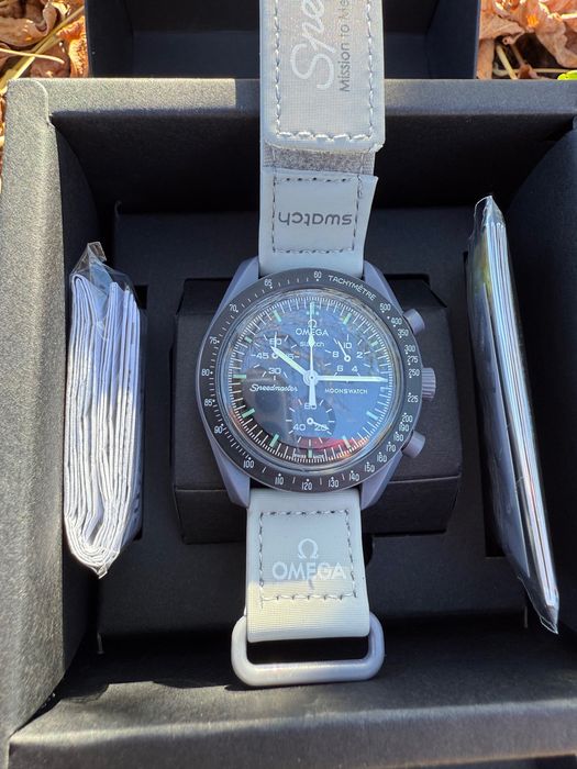 Omega Swatch mission to mercury sun pluto earth venus neptune uranus