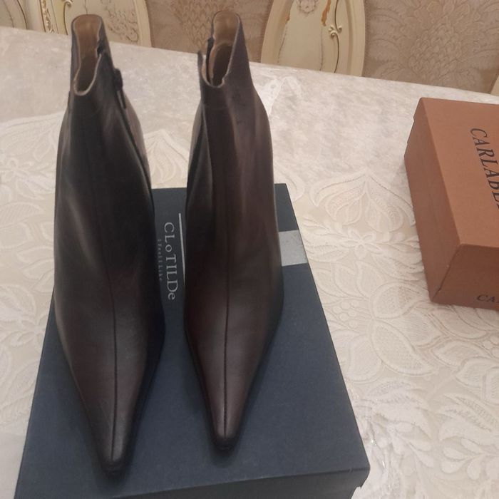 Продам новые сапоги