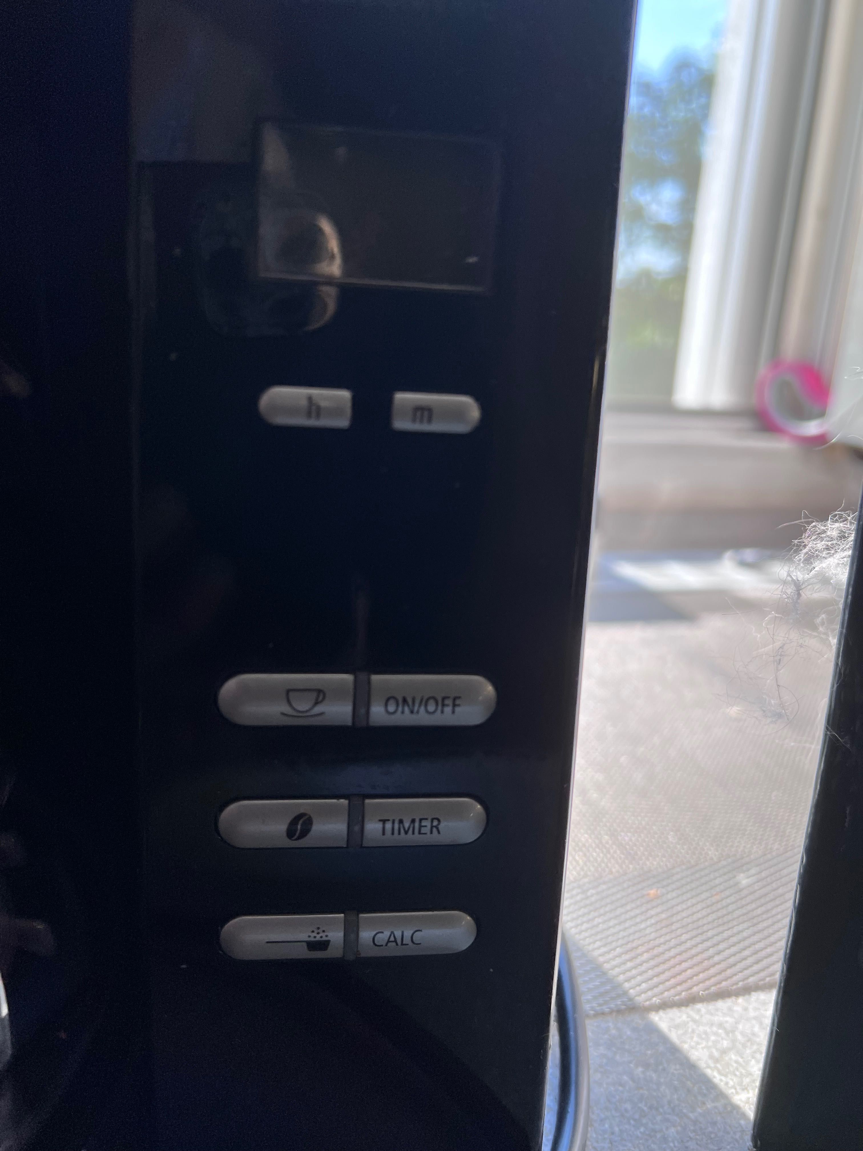 Cafetiera Melitta cu rasnita si timer