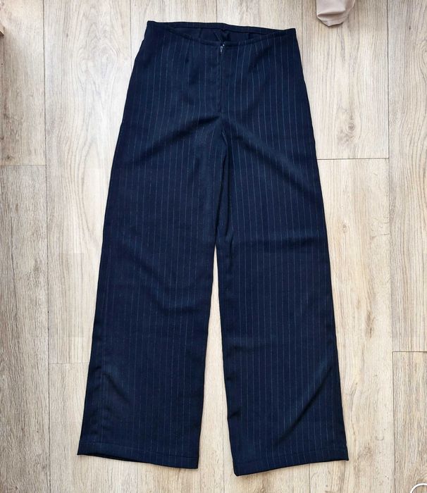 Pantaloni largi de dama