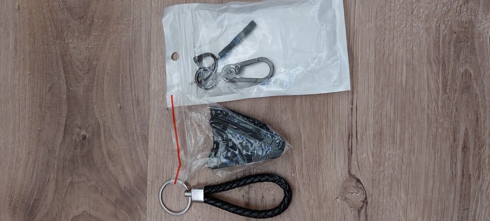 Breloc auto antipierdere cu nr de telefon