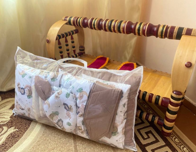 Көрпе жасауы бесікке