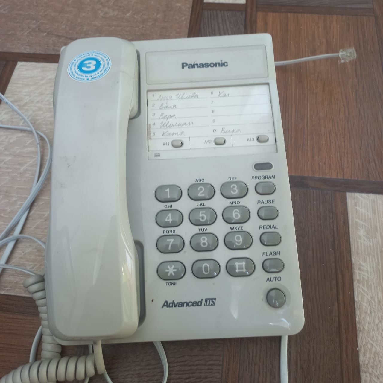 Телефонные аппараты. Panasonic. Сделано в Малайзии. Серого цвета.