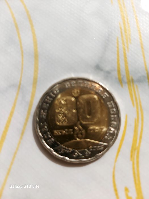 Продам ,монетку 200тгколлекционер 80лет