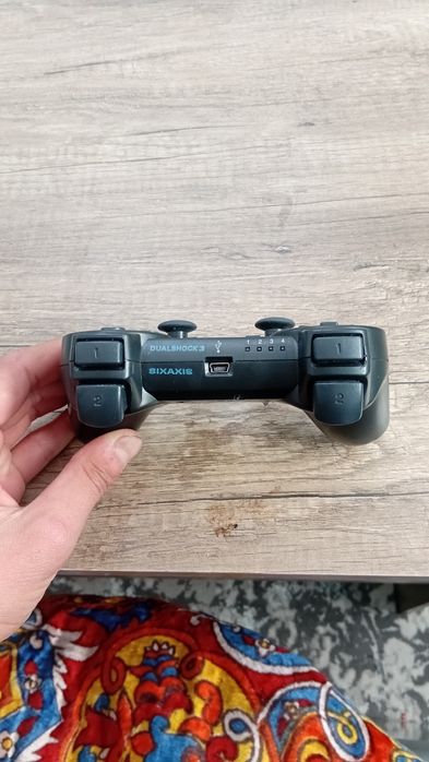 Gamepad PS3 holati ideal