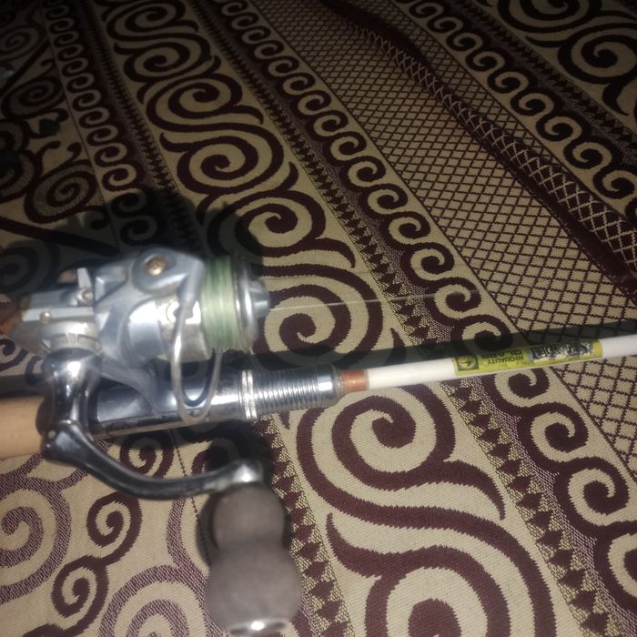 Удочка в зборе,катушка ,плетенка,спининг хорошего качество,,катушка ми