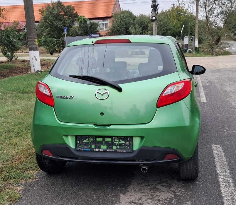 Vand mazda 2 1,3 benzina an 2010