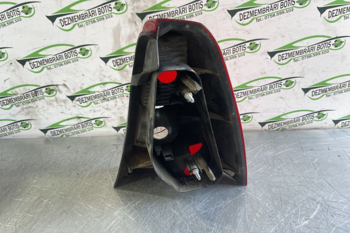 Lampa / Tripla stop stanga pe aripa 89070453 Dacia Logan prima genera