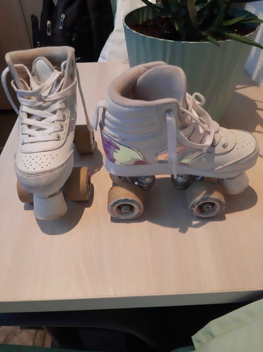 Vand role fetite Oxelo, marimea 33, foarte putin folosite.