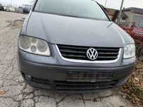 На части Vw Touran 1.9tdi автомат Dsg кожен салон 7 места