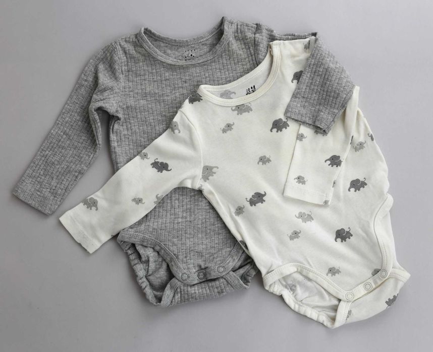 Лот от красиви бебешки дрешки от органичен памук на различни брандове.