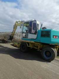 De vânzare  Excavator Liebherr pe roți