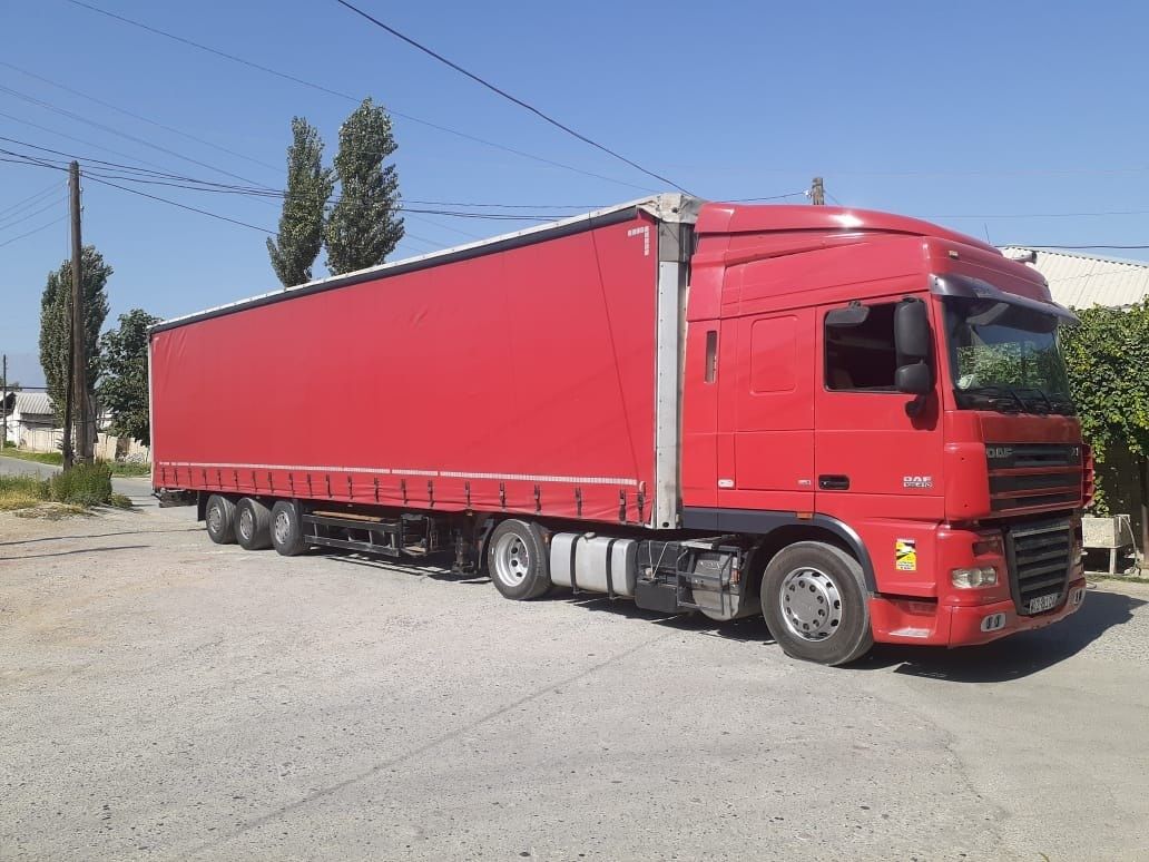 DAF 105.410 Мега тягач 2008 механика каропка, прицеп schmitz 2005