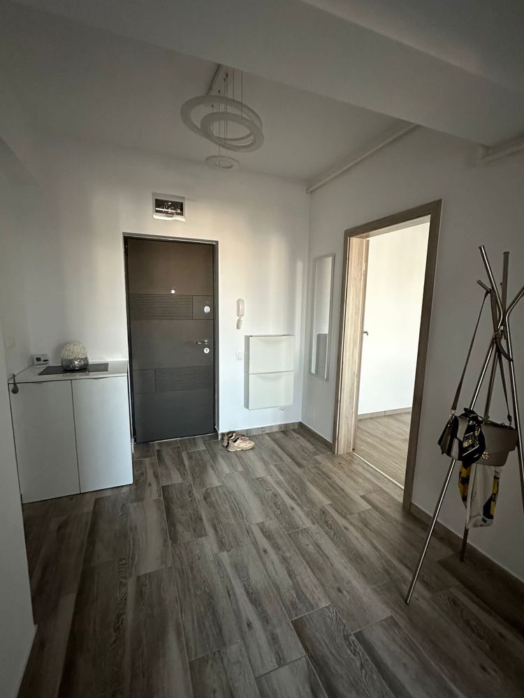 Inchiriez apartament nou 2 camere + loc parcare subteran