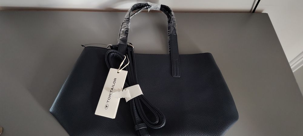 Vând o geanta tomtailor