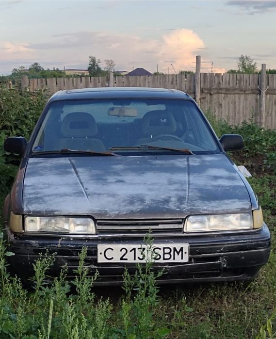 Mazda 626  көлігі.