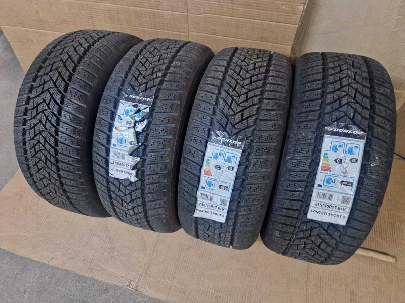 4 броя Dunlop R17 215/45/ 
нови зимни гуми 
DOT2319