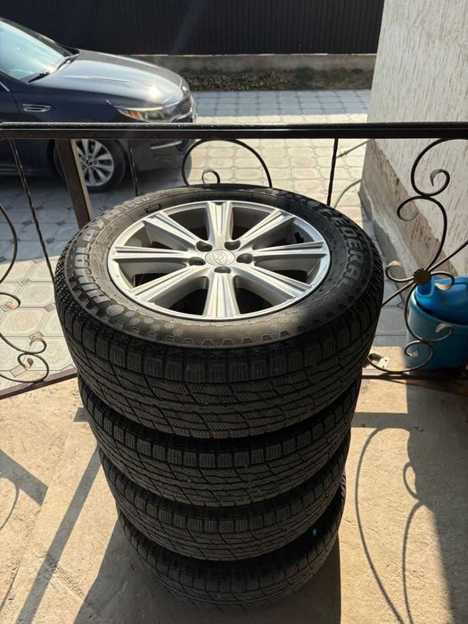 Продам б/у диски с зимней резиной на Субару