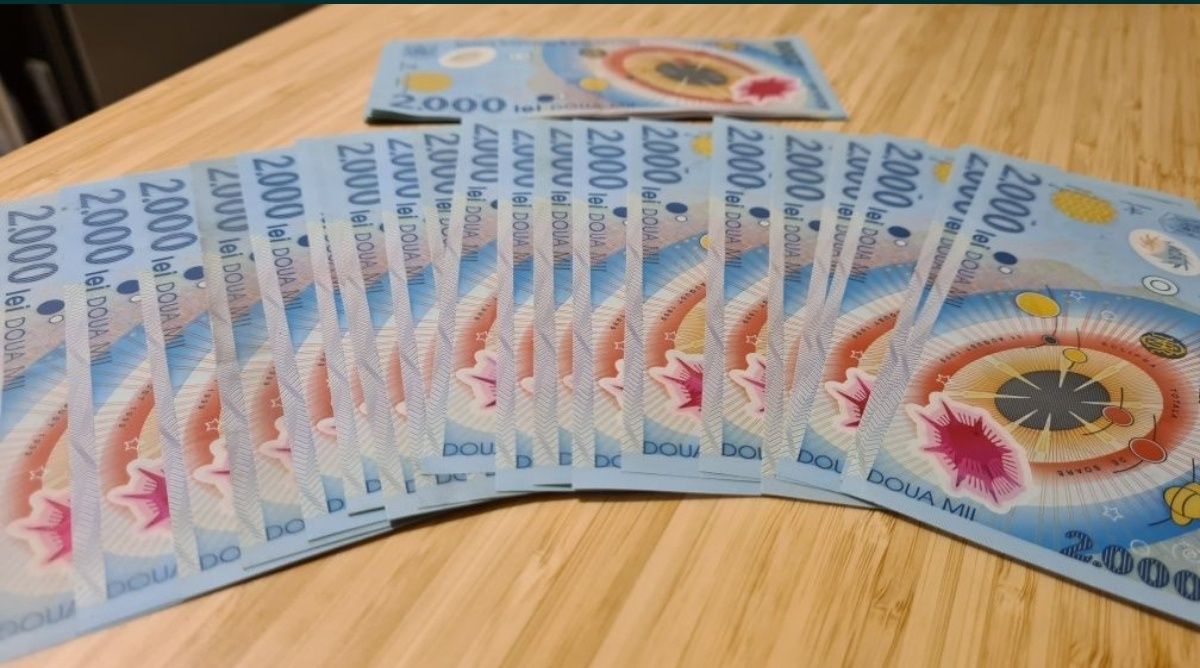 100 de bancnote eclipsa 2000 lei noi