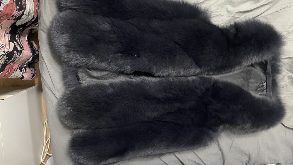 Женская меховая жилетка