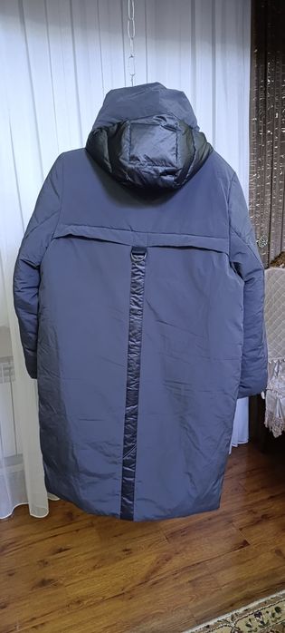 Пуховик аёллар пальтоси холати енгиде