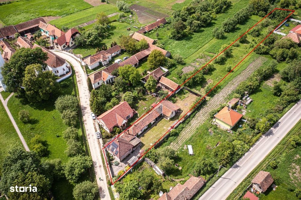 Casa 130 MP utili cu teren 2822 MP cu posibilitate destinatie comercia