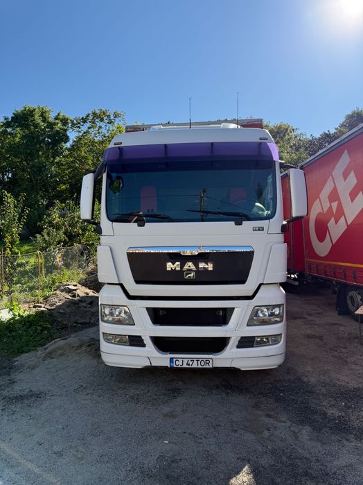 Man (camion tandem) tgx 24440,cu axa spate viratoare