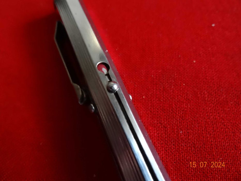 Doua pixuri metalice(cu 4 si 2 culori) ,din anii 1970