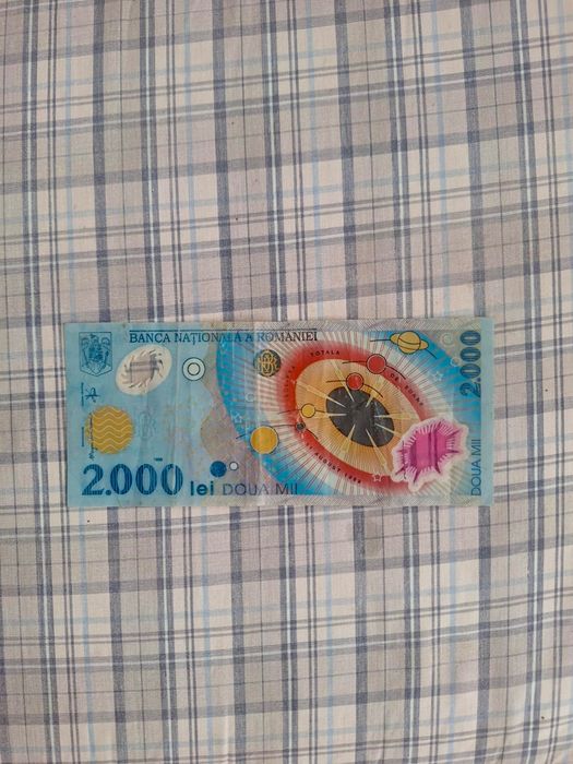 Bani vechi cu eclipsă de soare