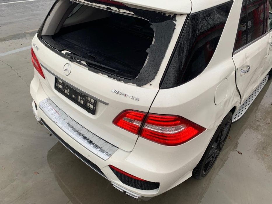 Dezmembrez ml 63 amg w166/bara spate amg/faruri ils/usi/capota/motor/