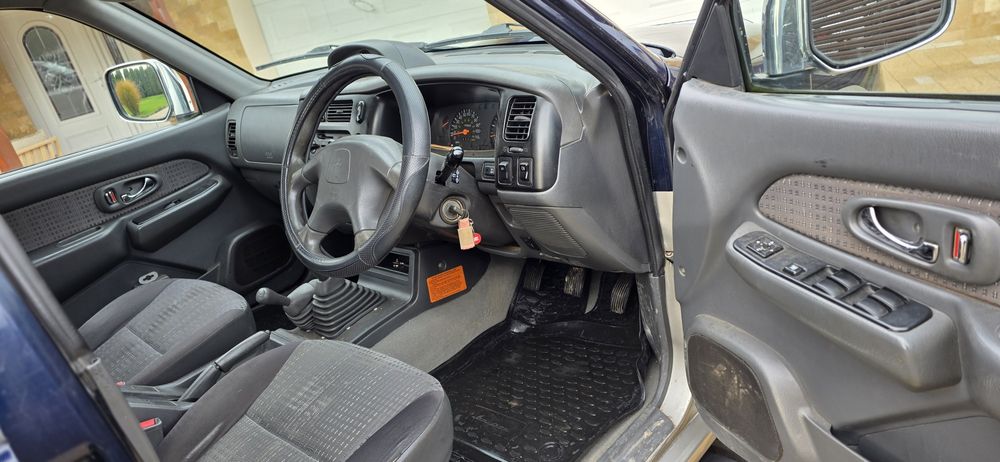 Mitsubishi L200 din 2005 volan pe dreapta 116 cp