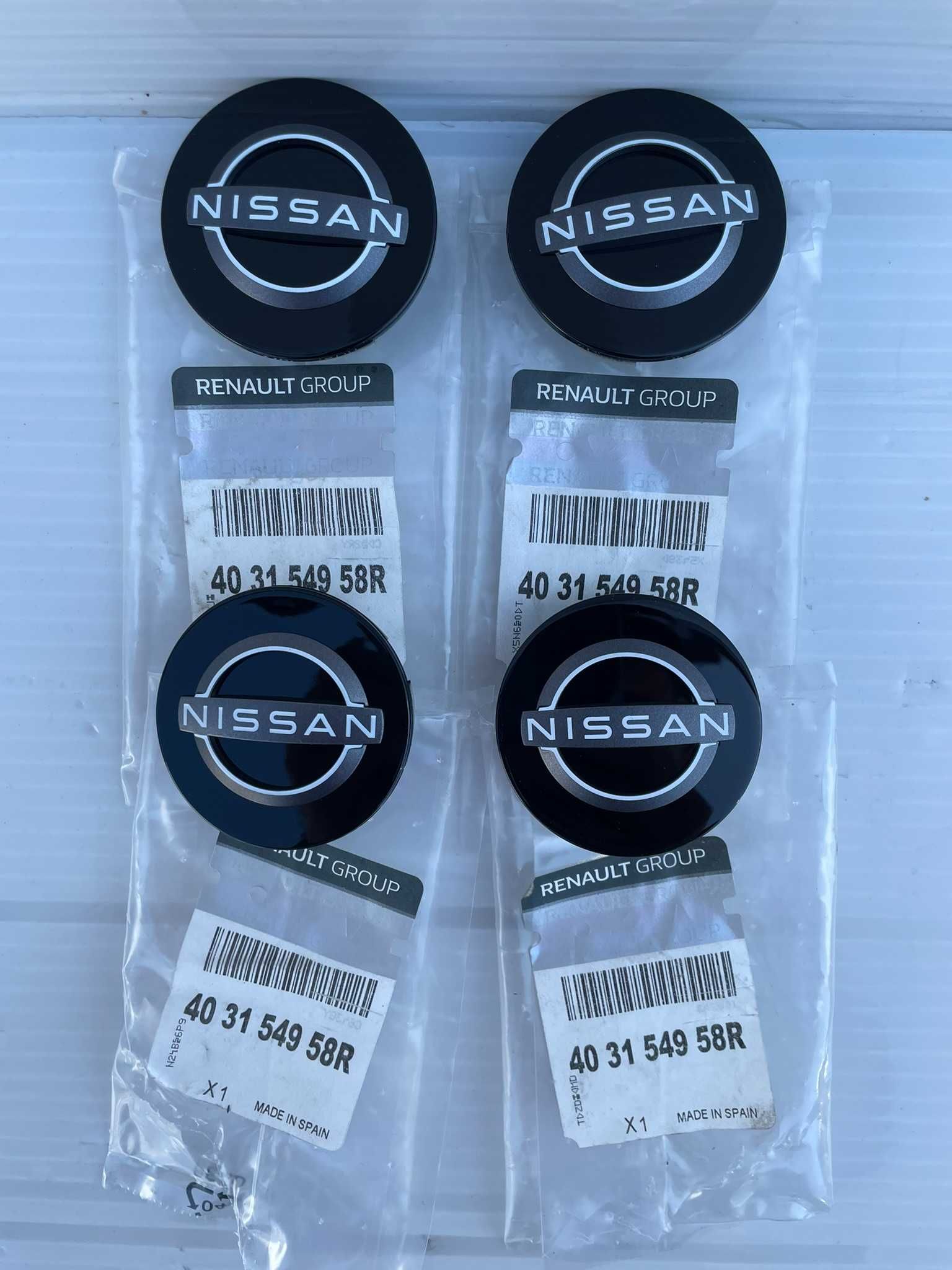 Capace capacele logo jante aliaj noi originale Nissan 57mm