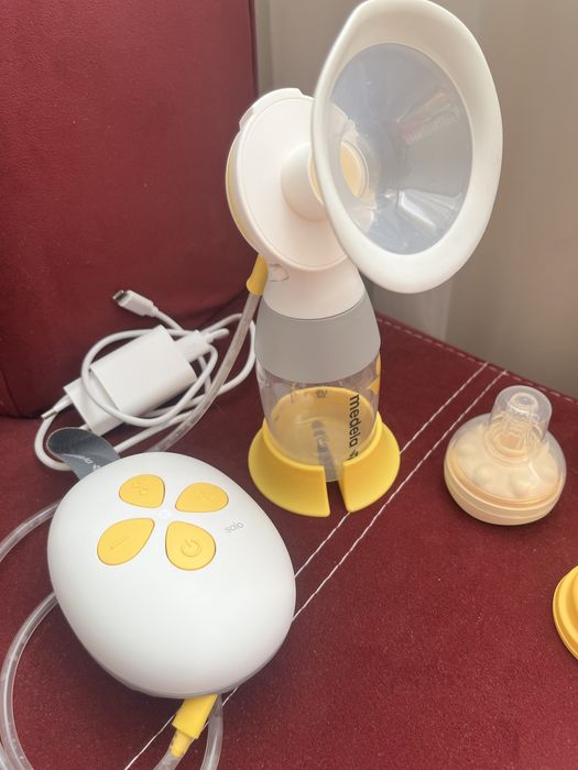 Помпа за кърма Medela Solo + пълен комплект аксесоари за успешно кърме