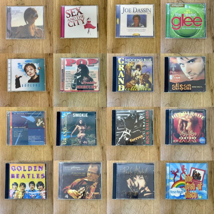 CD дисков  AC/DC, Pink Floyd, Mariah Carey, Bryan Adams и другие