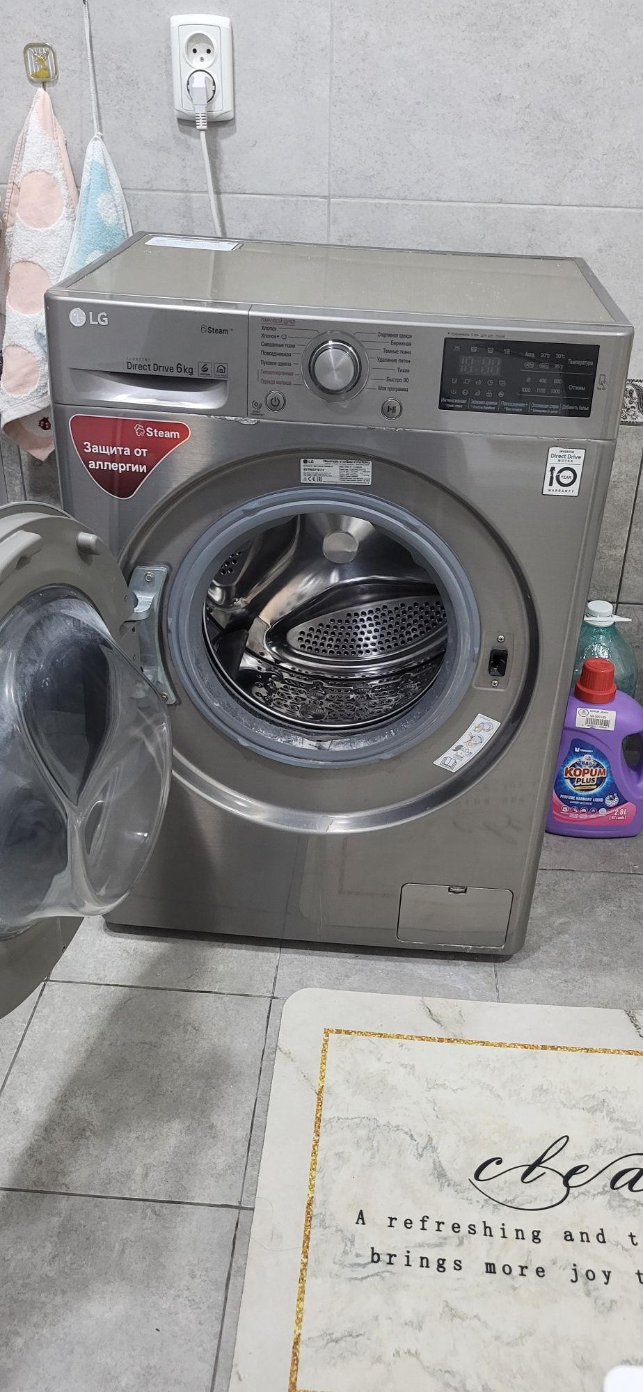 LG Direct Drive 6 kg sig'imli kir yuvish mashinasi ko'rinadi.